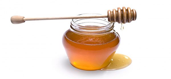 Honey uses to frizzy curly hair
